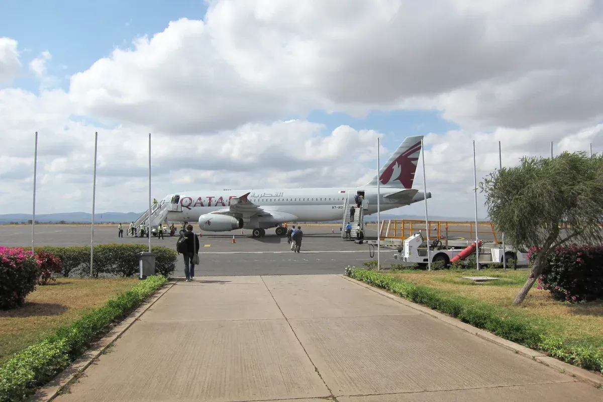 A plane on the apron at Kilimanjaro International Airport, a sight on Kilimanjaro climbing tours