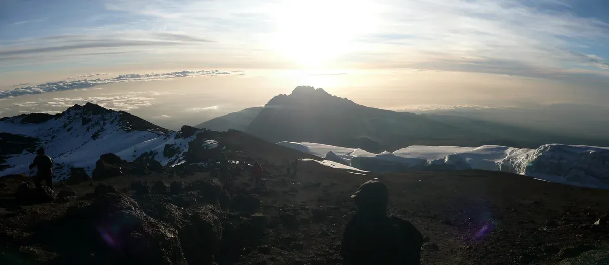 Mawenzi at sunrise seen from the Kibo crater rim, a sight on Kilimanjaro climbing tours